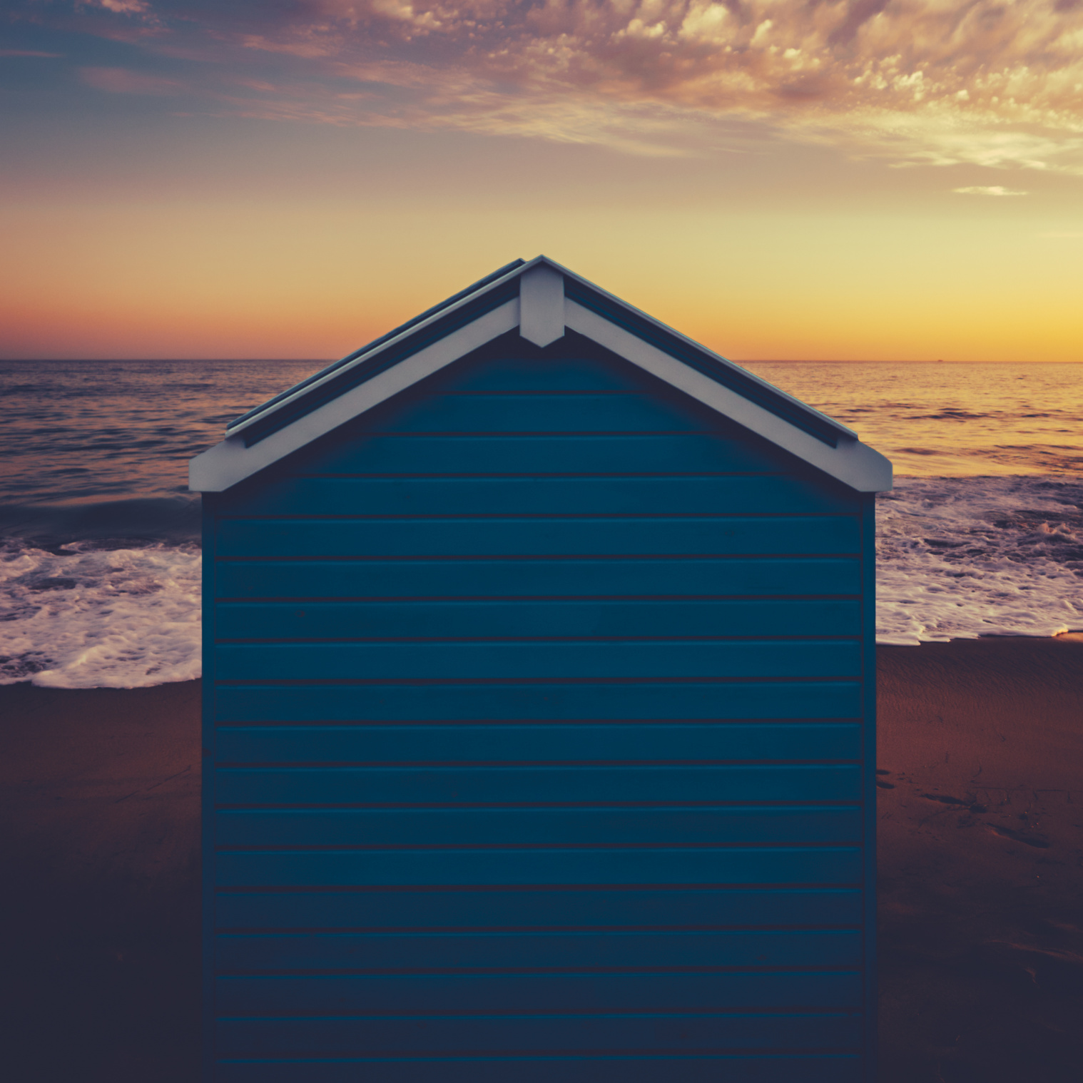 Beach hut on the coast in October overlooking the sea